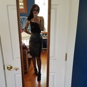 Flattering Black leather pencil skirt with snaps